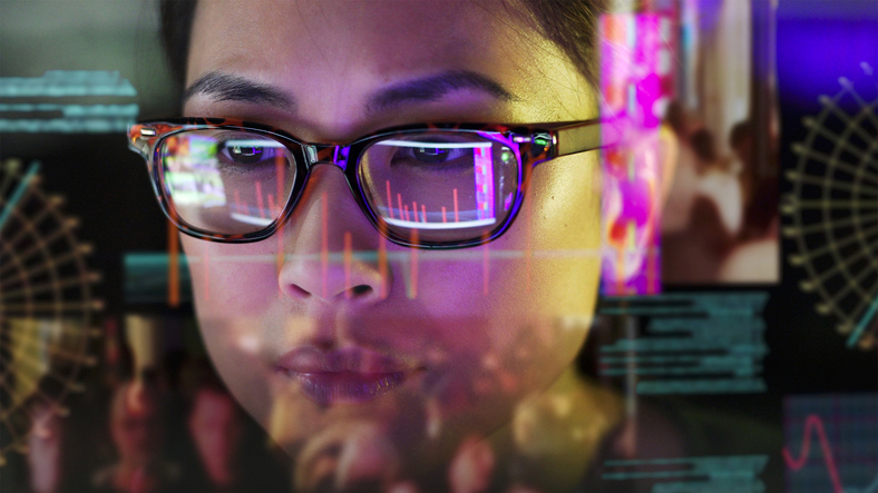 girl looking at computer screen