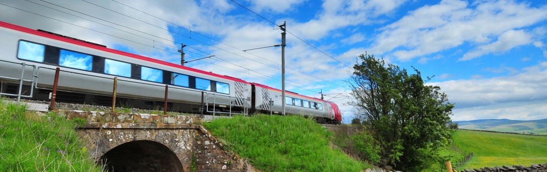 train travelling over bridge