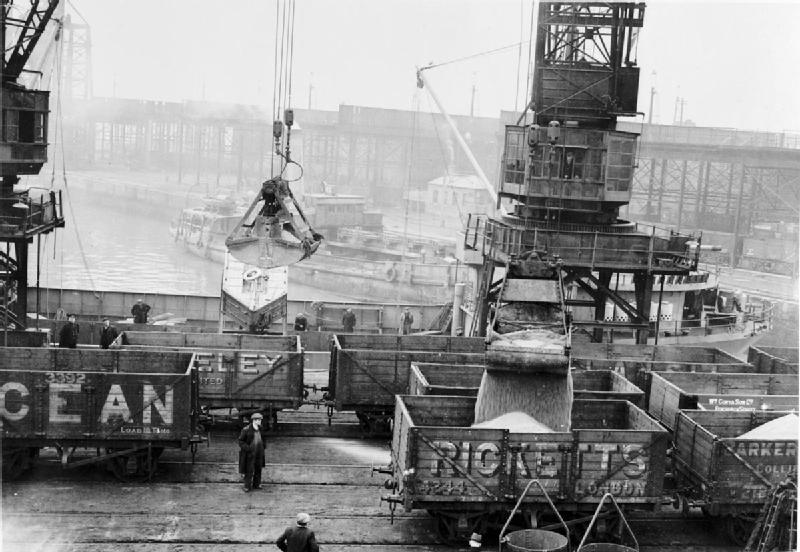 Cargo being loaded onto freight train wagons 1944